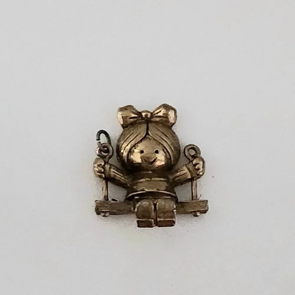 Avon vintage charm gold color